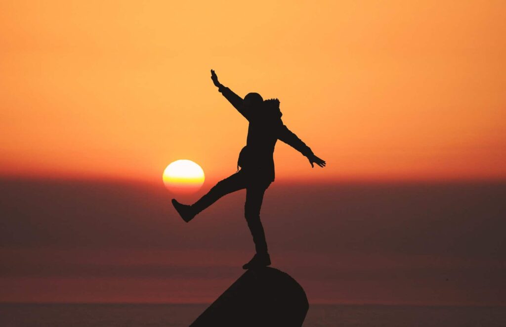 A happy man enjoying the sunset near our addiction treatment center in Tennessee.