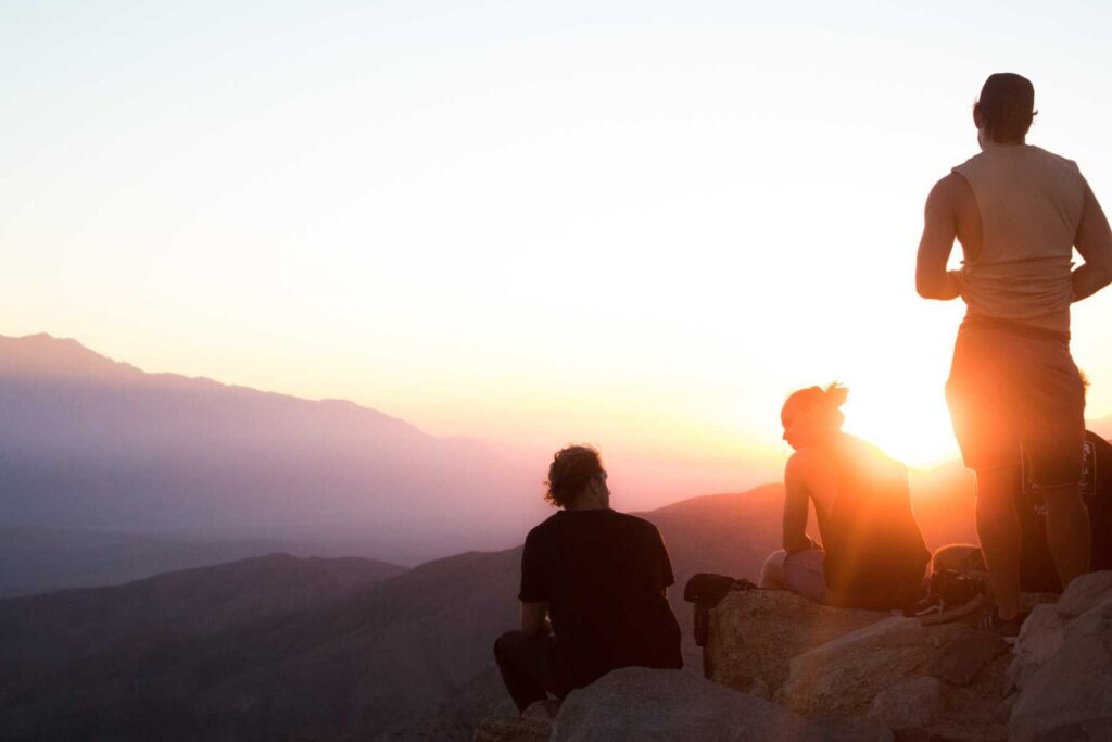 Group of people enjoying the sunset during their addiction treatment in Tennessee.