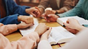 Group bible study in Christian rehab centers in Michigan.