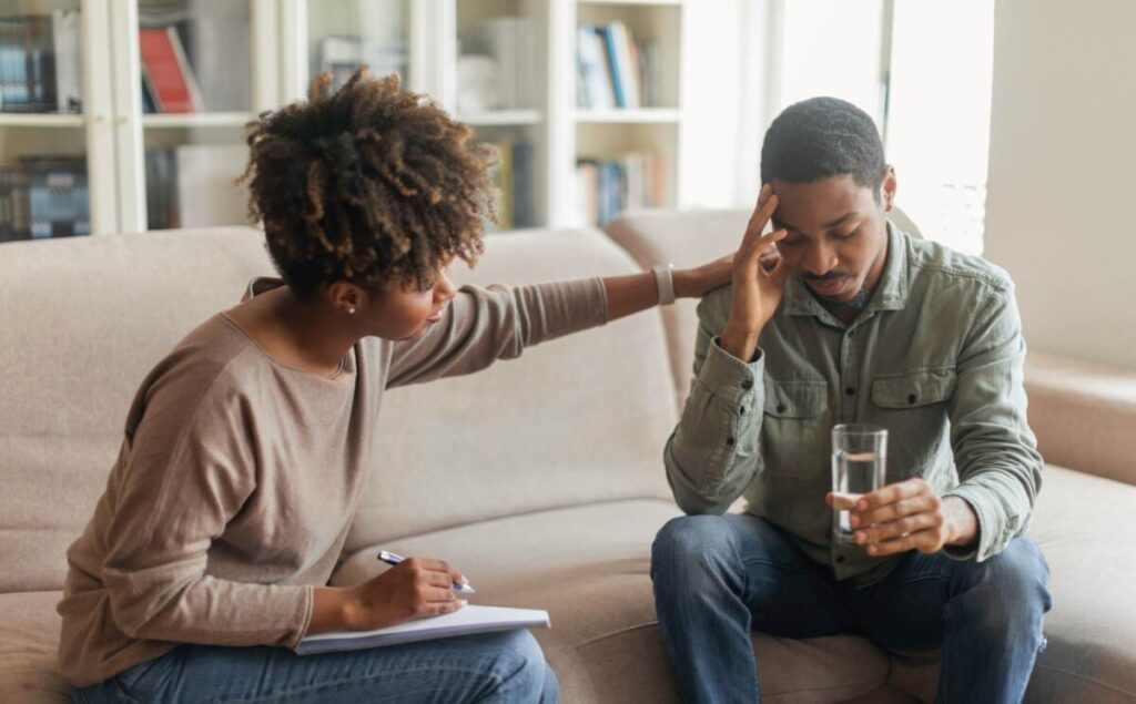 Therapist supporting client in depression treatment in Tennessee.